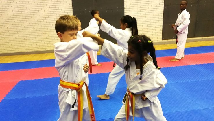 Children training in pairs